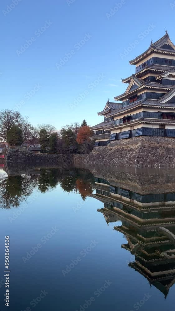 The historic Matsumoto Castle at sunrise in the autumn season, Matsumoto City, Nagano, Japan. The historic Matsumoto Castle at sunrise in the autumn season, Matsumoto City, Nagano, Japan.