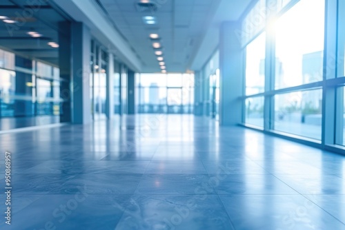 A long hallway with many windows providing natural light and a sense of openness