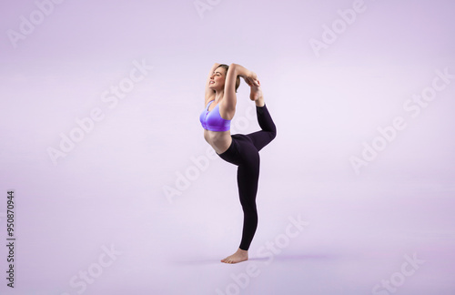 Full body length gaiety shot athletic and sporty woman doing healthy and meditative yoga exercise workout posture on isolated background. Healthy active and body care lifestyle