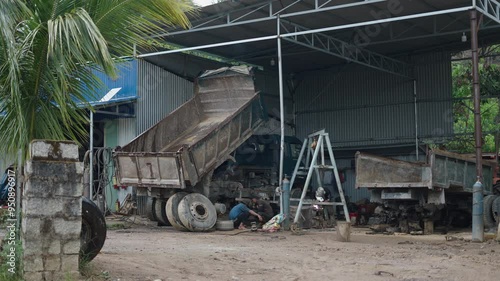 In the small family workshop three brothers work in precarious conditions to survive in Vietnam