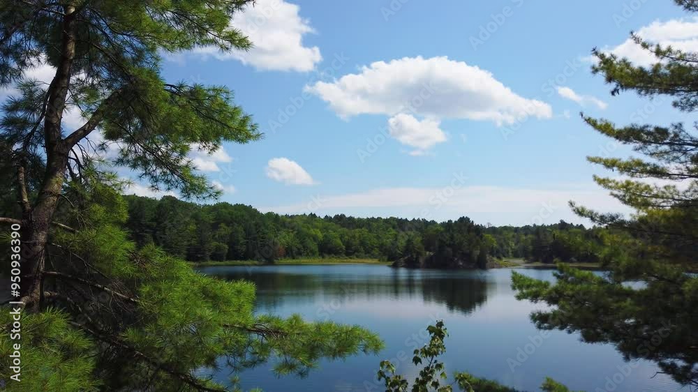 Picturesque view on Huron Lake and area of Cup and Saucer Nature reserve, Ontario, Canada. Picturesque view on Huron Lake and area of Cup and Saucer Nature reserve, Ontario, Canada.