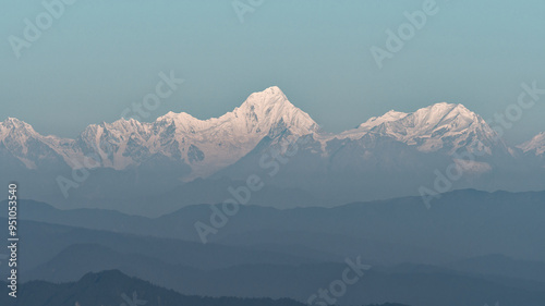 Beautiful scenery of Gongga snow mountain viewed at the top of Emei in early morning. Gongga Mountain is the highest mountain in Sichuan Province and is known as the 