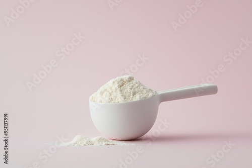 Plant-based vegan protein powder on pink background, sports supplement