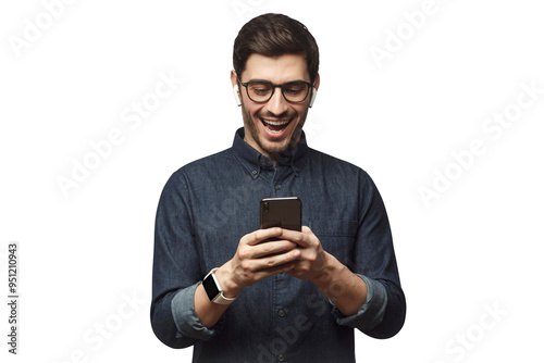 Young man laughing as he is looking at phone photo