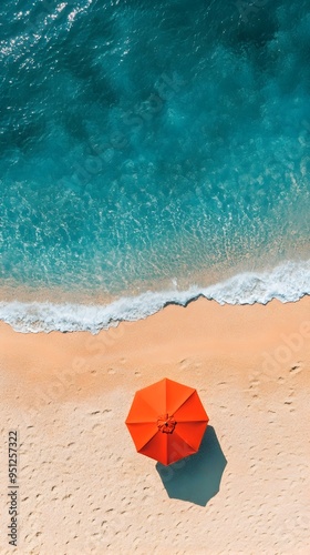 Aerial View of Vibrant Summer Beach with Captivating Umbrella Amid Turquoise Waters and Sandy Shores