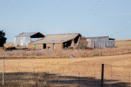 Old Australian stone building in farm landscape 