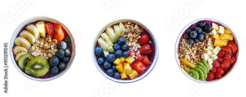 set of filled with some fruits topping acai bowl in a white bowl, top view