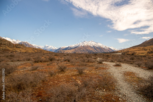 The Hakatere conservation park nestled in valley below the snow covered peaks of the Southern alps very close to Erewhon station