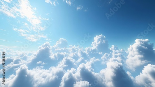 Serene fluffy white clouds against a clear blue sky, tranquil atmosphere