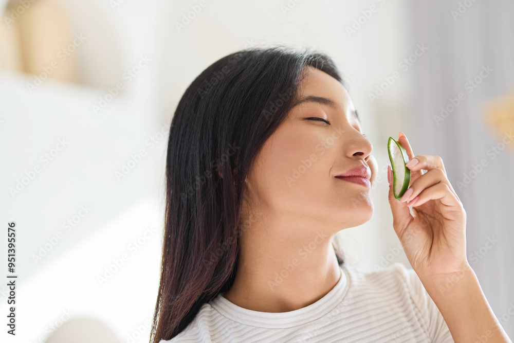 Organic Skin Treatment. Woman Enjoying Skincare with Fresh Aloe Vera Slice, Embracing Natural Beauty and Relaxation, Highlighting and Self-Care Rituals. Organic Skin Treatment. Woman Enjoying Skincare with Fresh Aloe Vera Slice, Embracing Natural Beauty and Relaxation, Highlighting and Self-Care Rituals.
