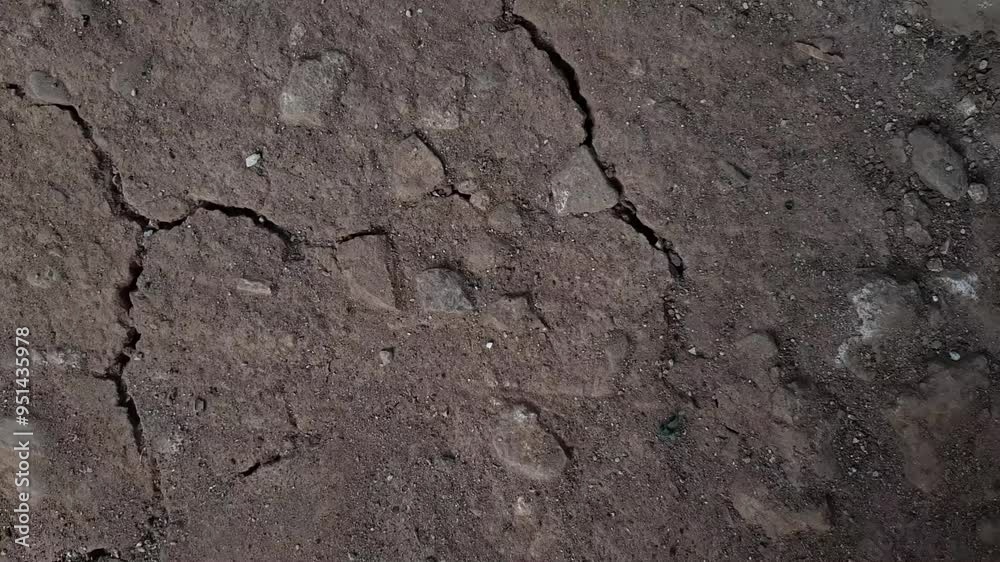 extremely dry and cracked soil surface