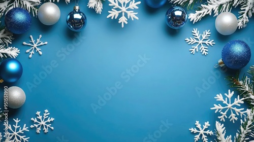 blue christmas background with snowflakes and christmas balls. Copy space backgrounds photo