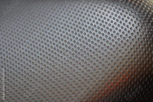 Close-up of a textured, dimpled surface.