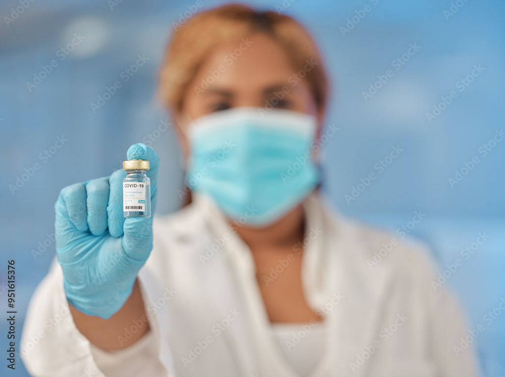 Woman, hand and scientist with vial on mask in vaccine investigation for decease, virus and pandemic. Female person, laboratory and healthcare specialist with cure on container for monkeypox Woman, hand and scientist with vial on mask in vaccine investigation for decease, virus and pandemic. Female person, laboratory and healthcare specialist with cure on container for monkeypox