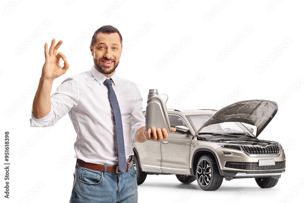 Driver holding an engine oil plastic bottle and gesturing ok sign