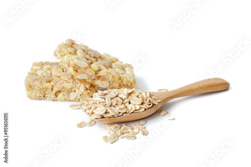 Muesli bar or granola bar with oat flakes isolated on white background.