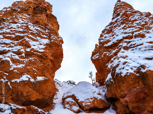 Snow scene colorful cliffs with red rock and stone in Bryce Canyon National Park