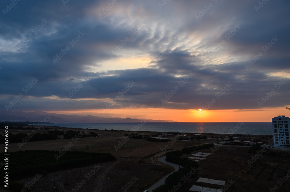 Cloudy sky over rocky coastline Cloudy sky over rocky coastline