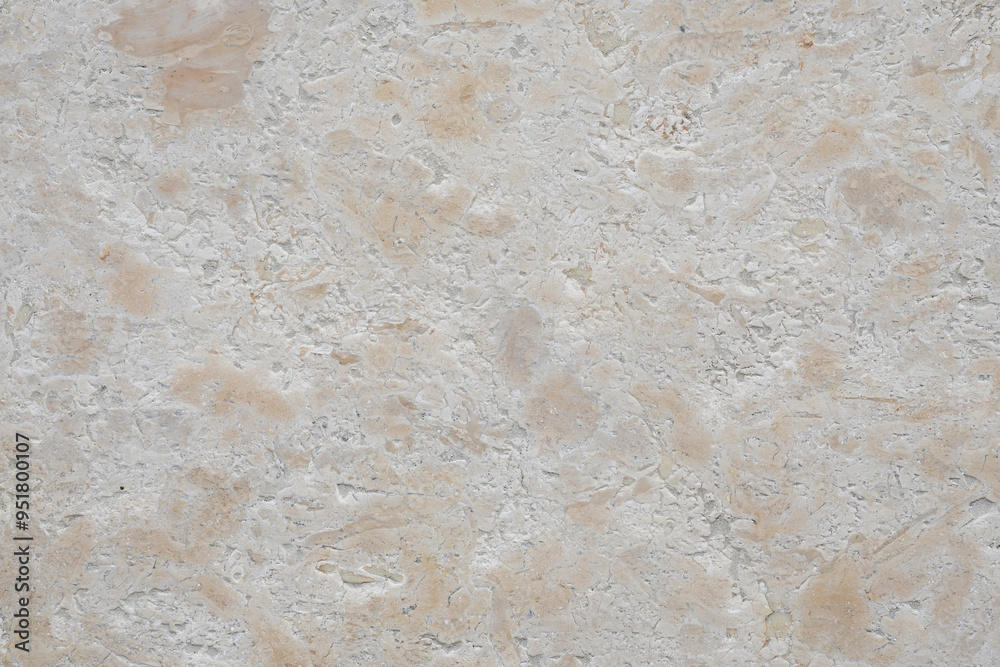 Travertine stone texture forming a beige pattern background Travertine stone texture forming a beige pattern background