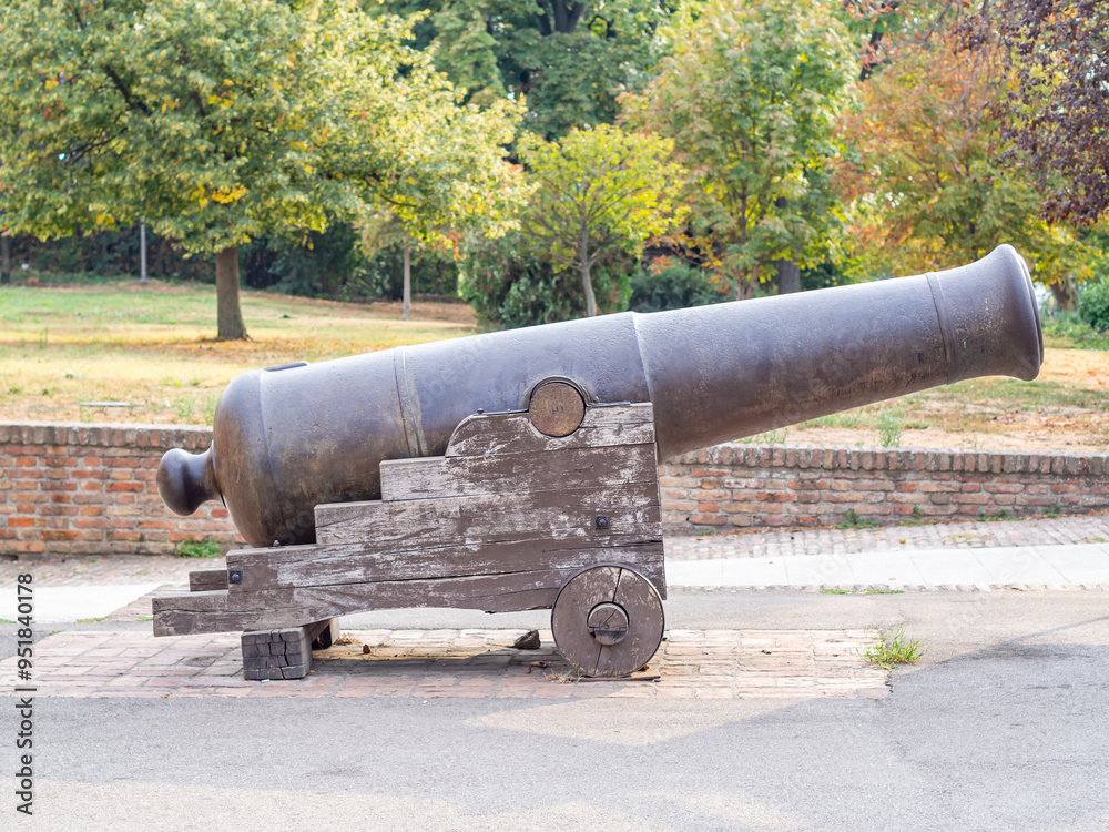 Old cannon mounted on a wooden wheeled carriage Old cannon mounted on a wooden wheeled carriage