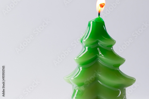 Tree gray with candle on the. room gift interior concept. a tree green with a fire in the in gray. a tree in green and gray with a fire in the lifestyle. photo