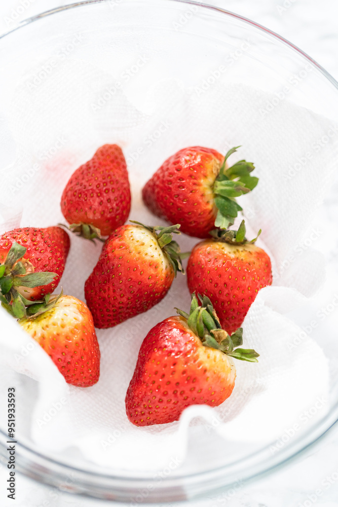 Washed and Dried Strawberries Neatly Stored in a Glass Bowl