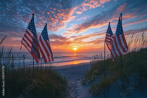 American flags on the beach at sunset, commemorating memorial day

