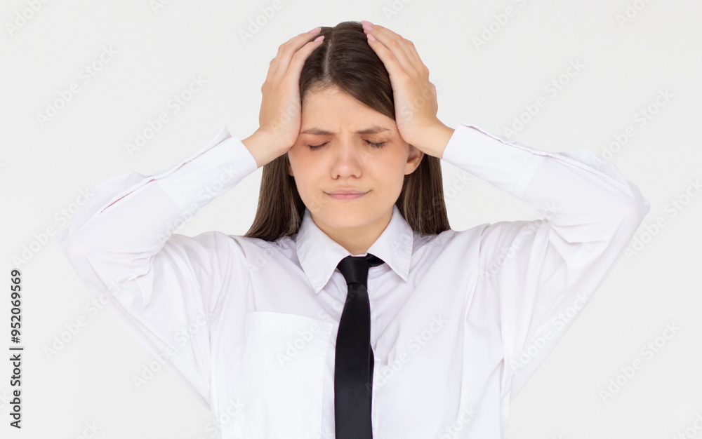 Woman with hard headache holding hands on head. Young woman touching her temples feeling stress, on white background. Woman suffering from headache. Woman with hard headache holding hands on head. Young woman touching her temples feeling stress, on white background. Woman suffering from headache.