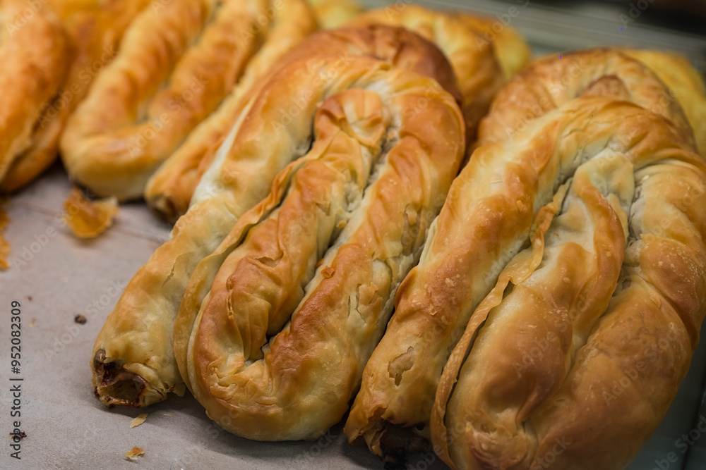 Burek is filo pastry roll filled with cheese, meat, potato, spinach, apple. For breakfast, lunch, dinner, or snack. Burek, also known as bourék, byurek, pita, bourekas, and cheese pie. Burek is filo pastry roll filled with cheese, meat, potato, spinach, apple. For breakfast, lunch, dinner, or snack. Burek, also known as bourék, byurek, pita, bourekas, and cheese pie.