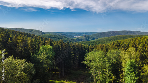 Aerial drone view of Ardennes mountains nature landscape from above, hills and forest on summer