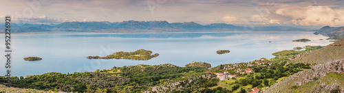 Panoramic view of a scenic coastline with an island in Montenegro, perfect for a summer vacation. photo