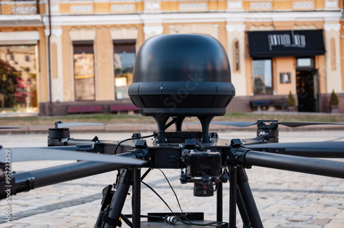 Military aerial unmanned copter drone bomb carrier. Military equipment for war army. Aerial drone military equipment with remote control. New technology