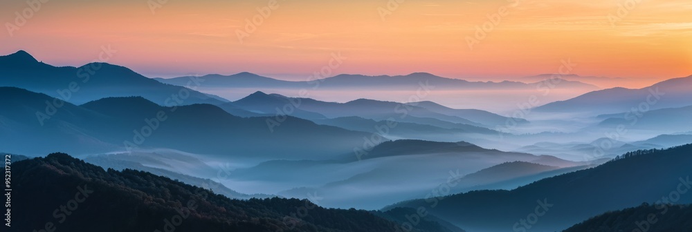 Obraz premium Sunrise Over Misty Mountain Range. Beautiful Landscape Shot Sun Rising Mist Mountains. 