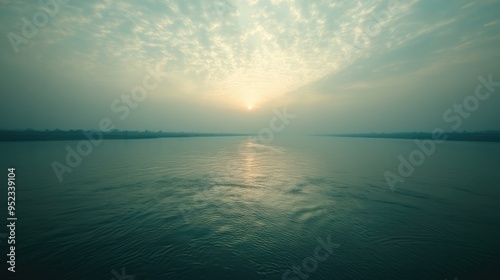 Sacred Ganges River flowing with space for text in the sky or water. Holy river in Hinduism.