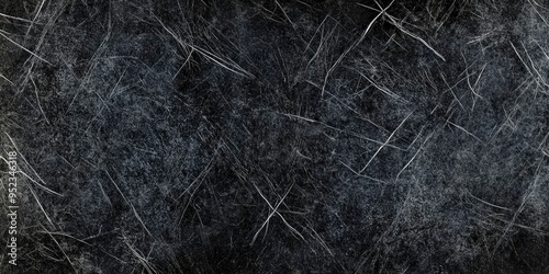 An image created digitally that features a rough, grayscale pattern of dirt and scratches on a black background.