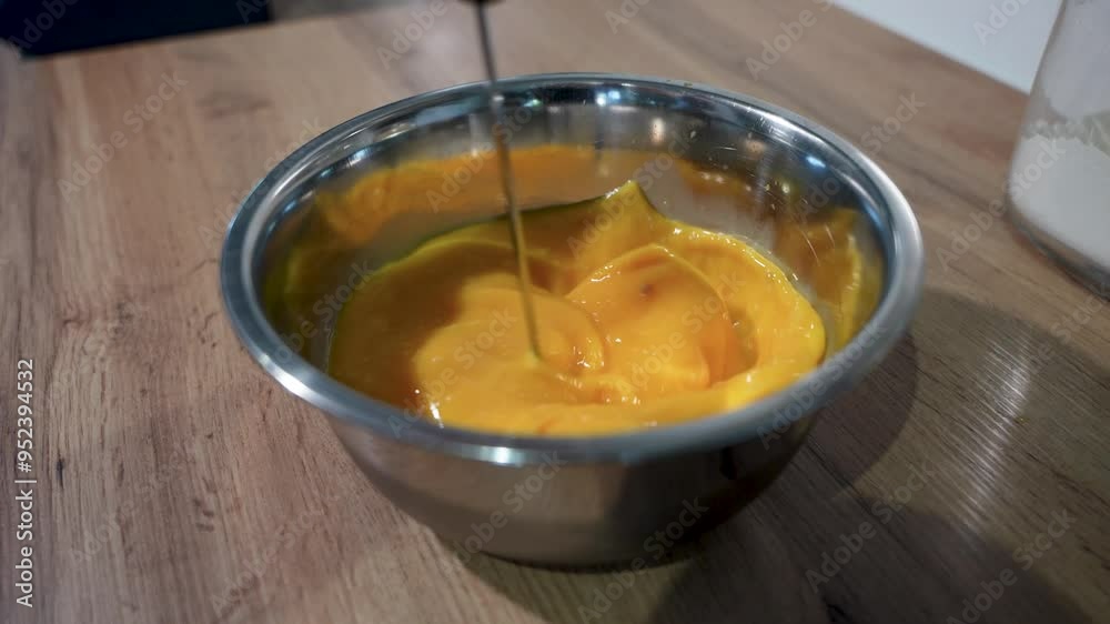 Cracking Eggs for Cooking and Preparing Delicious Dishes in a Contemporary Kitchen Environment, high quality video, 4k Cracking Eggs for Cooking and Preparing Delicious Dishes in a Contemporary Kitchen Environment, high quality video, 4k