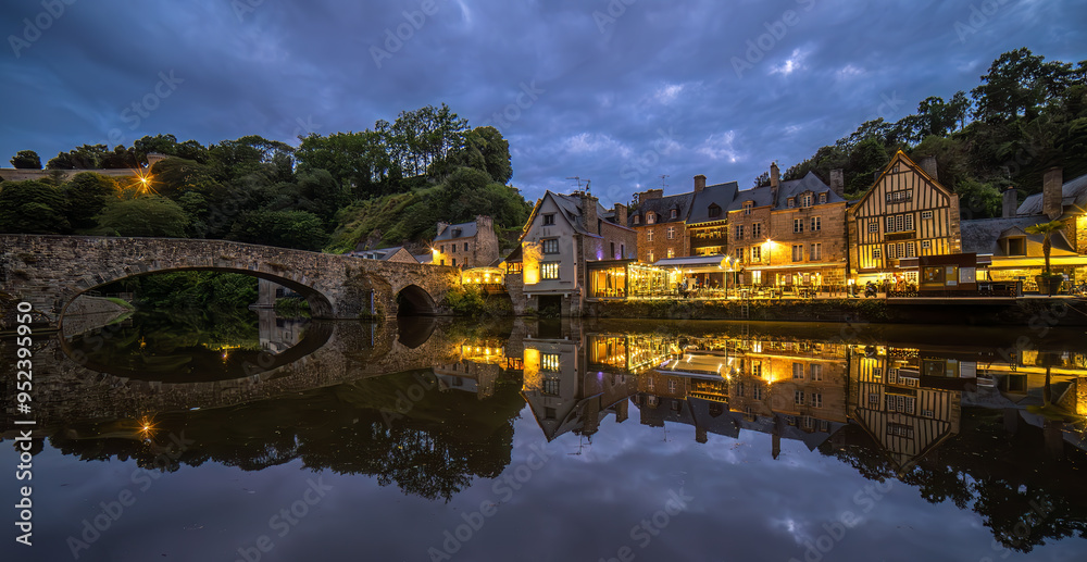 Fototapeta premium Port de Dinan with stone bridge, picturesque town of Dinan, Brittany, along the Rance River.
