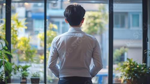 Rear view Asian business man being frustrated standing in office hopelessly : Generative AI Free Download Rear view Asian business man being frustrated standing in office hopelessly : Generative AI - GFXLoad