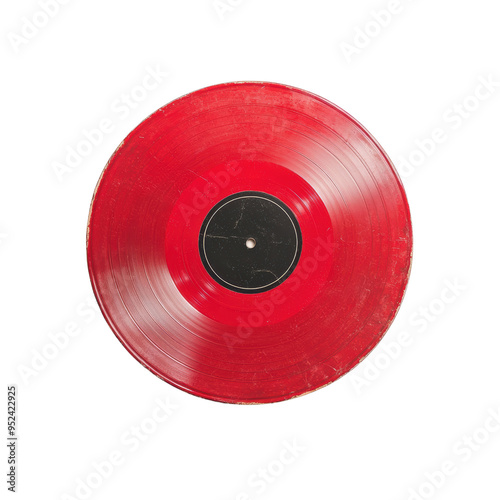 Top view of a vintage red vinyl record featuring a black label in the center, isolated on white background.
