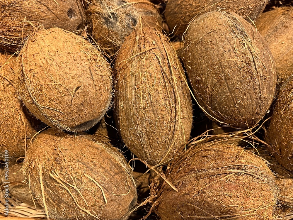 Close up of many Coconuts in a basket Close up of many Coconuts in a basket