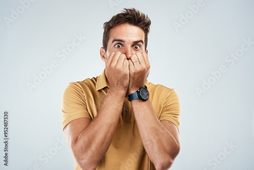 Quadro em tela Man, scared and nervous in studio portrait, anxiety and suspense for announcement on white background