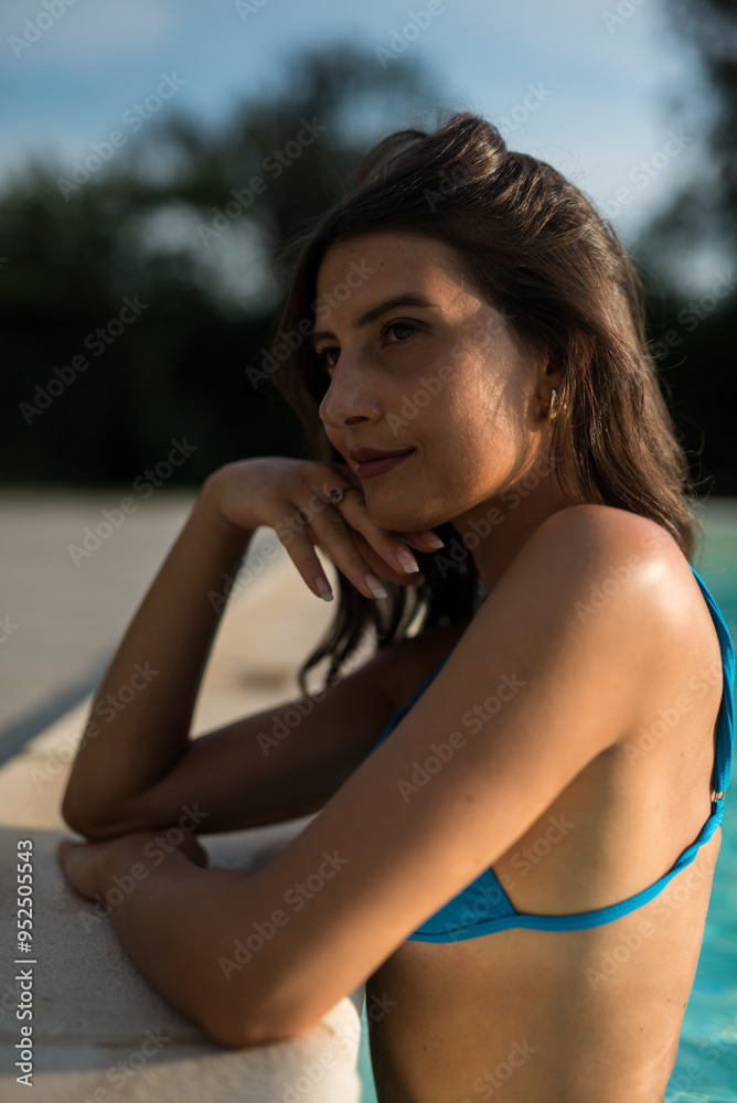 hot brunette with blue bikini at pool hot brunette with blue bikini at pool