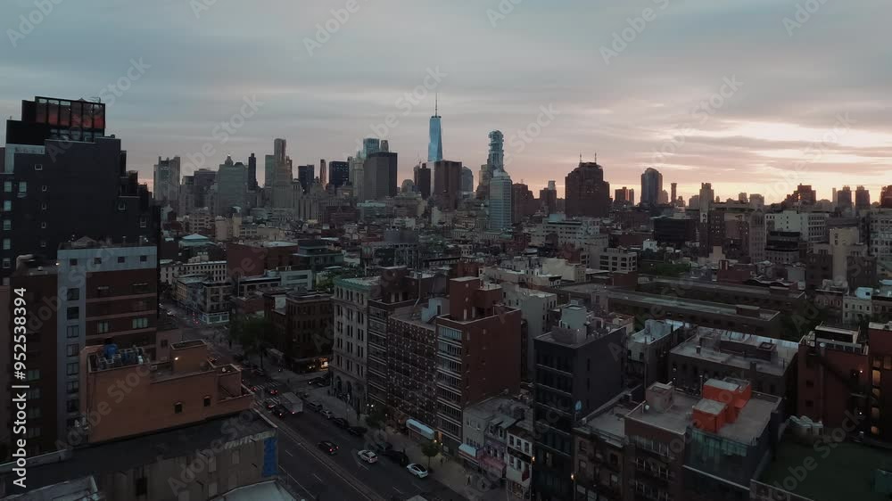 Timelapse video of New York, USA from day to night. Timelapse view of downtown New York with World Trade Center in the background. Moving clouds and sunset sky in NYC.
