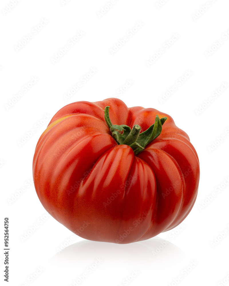 Red ripe organic tomatoes in a plate on the table