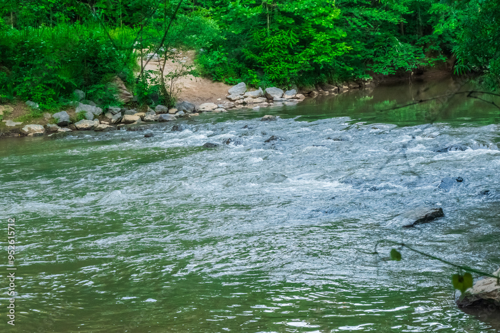 The tranquil waters remind us to pause and enjoy the moment, Little River, Woodstock, Georgia, United States of America The tranquil waters remind us to pause and enjoy the moment, Little River, Woodstock, Georgia, United States of America