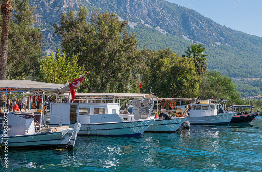 Türkiye - Tour boats in the Azmak district of Akyaka, Mugla.