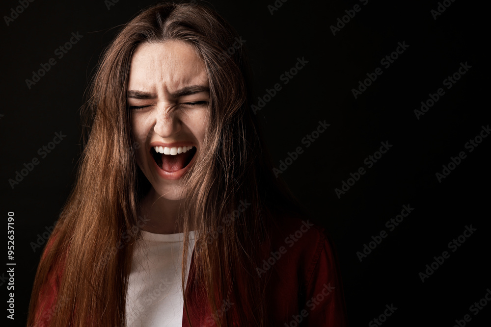 Portrait of scared woman on black background. Space for text Portrait of scared woman on black background. Space for text