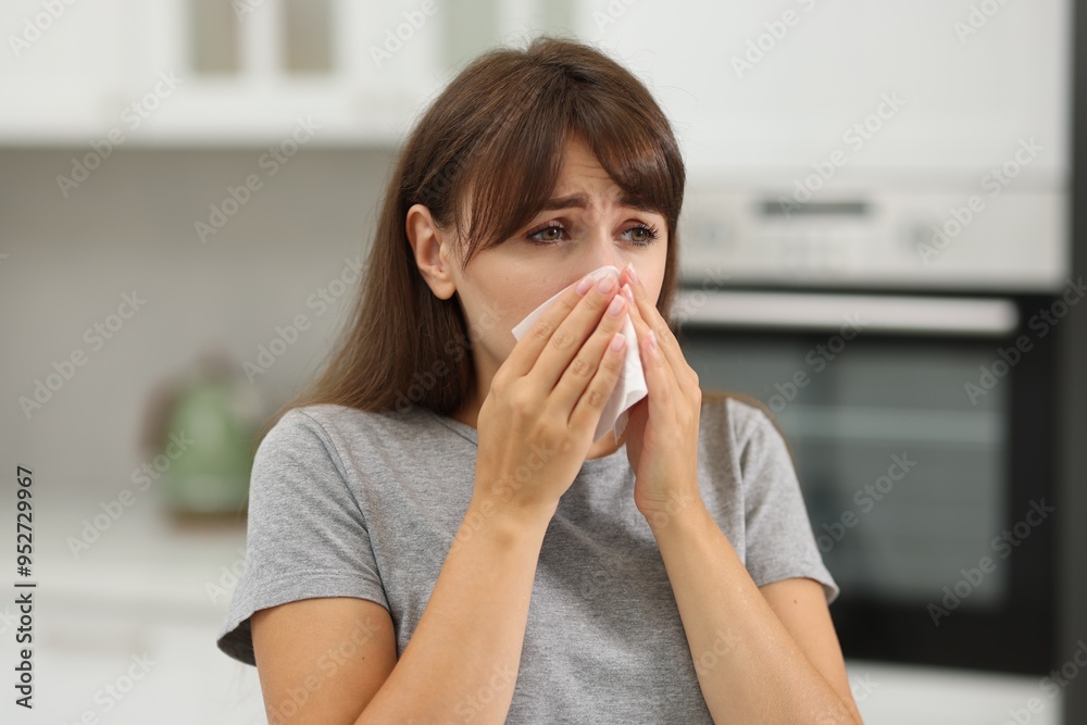 Woman with napkin suffering from sinusitis at home Woman with napkin suffering from sinusitis at home