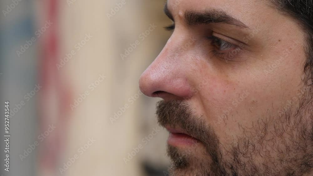 difficulties, problems - close up on anguished man's face closing his eyes difficulties, problems - close up on anguished man's face closing his eyes