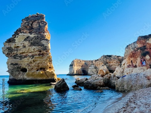 Oddly shaped jagged rock formations and cliffs at Lagoa Beach, Faro District, Southern Portugal.